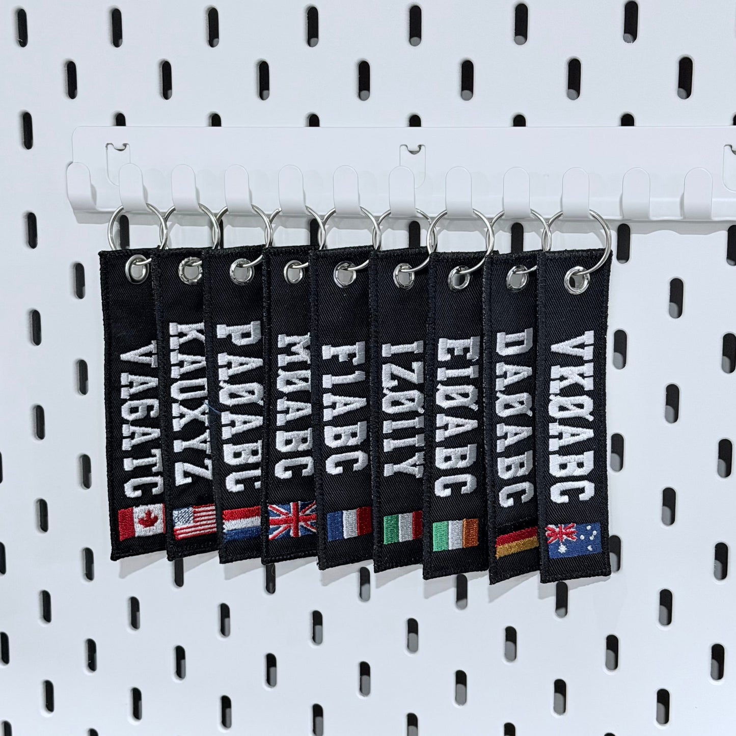 Group of various ham radio keytags and countries