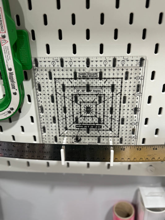 A 3D printed ruler holder for an Ikea Skadis pegboard. Perfect for quilting